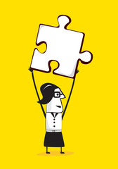 Businesswomen holding up a puzzle