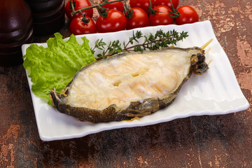 Baked wolffish steak