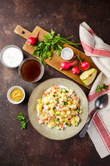 Cold Soup Okroshka with sausage, vegetables and kvass