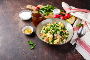 Cold Soup Okroshka with sausage, vegetables and kvass