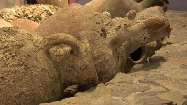 Fethiye Archaeological Museum, Fethiye, Turkey - 8th of April 2019: 4K Close up viewing ancient amphoras after shipwreck