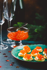 Delicious appetizer with red caviar.