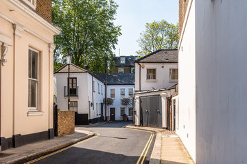 Fototapeta na wymiar Townhouses in alley in Notting Hill in London