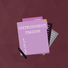 Writing note showing Cryptocurrency Trading. Business photo showcasing simply the exchange of cryptocurrencies in the market Lined Paper Stationery Partly into View from Pastel Folder.