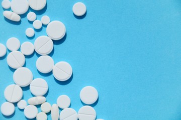 pills on a black background