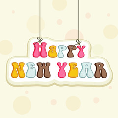 New Year celebration with hanging text.