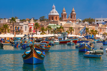 Taditional eyed boats Luzzu in Marsaxlokk, Malta - obrazy, fototapety, plakaty