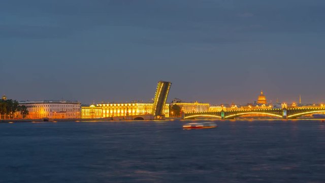 St. Petersburg, Russia Circa June 2019: Big ships pass through the open bridge in white night, time-lapse.
