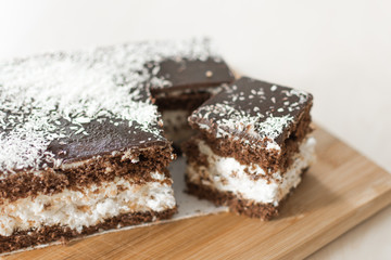 Chocolate cut cake top view. Sweet chocolate pie.