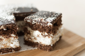 Chocolate cut cake top view. Sweet chocolate pie.