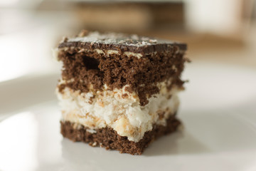 Chocolate cut cake top view. Sweet chocolate pie.