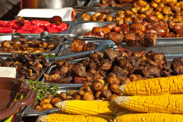 Different types of fried meat on the table. BBQ at the festival.