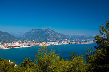 Naklejka premium Beautiful view of the Mediterranean Sea, the mountains, the forest and the city. Turkey, Alanya.