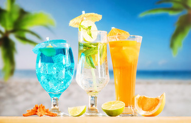 Blue mint orange drinks and sliced citrus red starfish