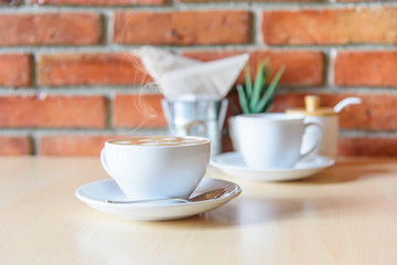 hot coffee with smoke on the table 