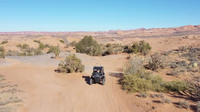 Aerial adventure dune buggy exploring mountains in Utah on vacation out west