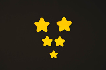 yellow stars on black background