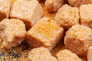 Rock sugar on dark background close up