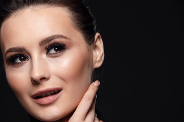 Fototapeta premium Eyelashes Makeup. Woman Beauty Face With Black Lashes Extensions