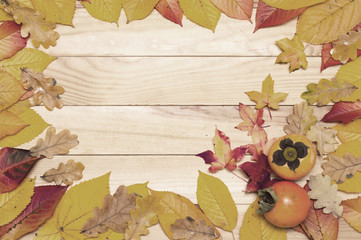 Naklejka na ściany i meble Autumn background, yellow leaves and gifts of autumn, blank background.
