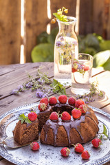 chocolate cake with fresh strawberries and chocolate icing summer mood