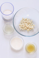 Different ingredients for cooking bakery foods, on white background.