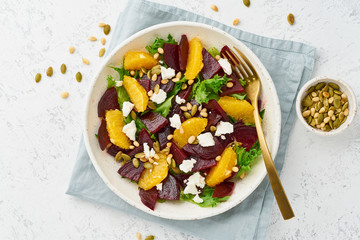 Vegan salad with beet curd avocado orange feta ricotta and pumpkin seeds, keto ketogenic dash diet,...