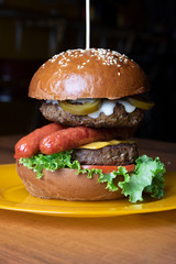 black and green sesame buns, burgers with cutlets and vegetables