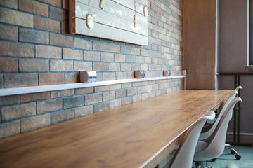 Big wooden table in interior of modern office