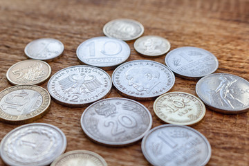 coins old before euro pile pack heap on a wooden background mock up selective focus close up