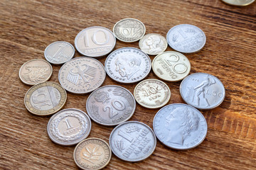 coins old before euro pile pack heap on a wooden background mock up selective focus close up