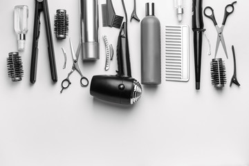 Set of hairdresser tools and accessories on white background