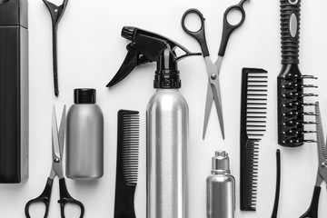 Set of hairdresser tools and accessories on white background