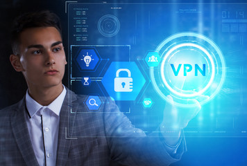 The concept of business, technology, the Internet and the network. A young entrepreneur working on a virtual screen of the future and sees the inscription: VPN