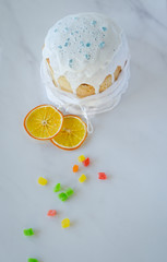 Happy Easter, traditional Russian easter cake Kulich on a white background, decorated with color decorations