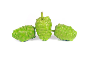 Noni or Morinda Citrifolia fruit isolated on white background herb concept.