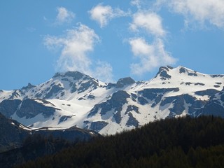 Fototapeta na wymiar The mountains of the Italian Alps, in Val d'aosta, near the village of Chamois, Italy - June 2019.