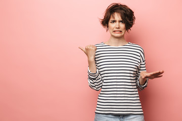 Portrait of a pretty brunette girl wearing casual clothing