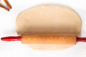 Food baking concept bakery preparation proofed bread dough for bread or cinnamon rolls on white background