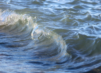 Waves on the seashore as an abstract background
