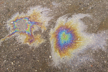 Gasoline stains on the wet as a background