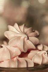 Pink meringues close-up