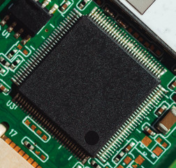 Macro photo of laptop microcircuits close-up with place for signature