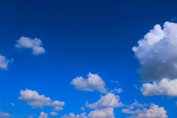 Naklejka na ściany i meble Beautiful Clouds Over Blue Sky Background. Nature, Landscape Concept. Beautiful Sky Background.