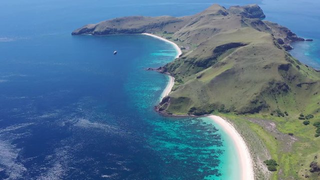 A beautiful coral reef fringes the scenic island of Gili Banta just outside of Komodo National Park. This area of Indonesia is known for its spectacular tropical marine biodiversity.