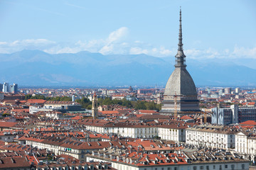 Fototapeta na wymiar Mole Antonelliana tower and Turin city in a sunny summer day in Italy