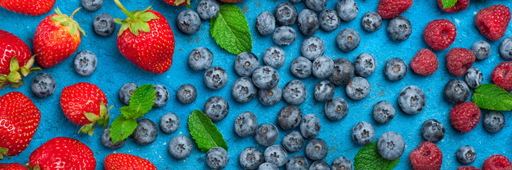 Fresh summer berries strawberry, blueberry, raspberry. Various fresh summer berries. Long web format