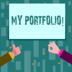 Writing note showing My Portfolio. Business photo showcasing Samples of work Art drawings photography Two Businessmen Hands Gesturing the Thumbs Up and Okay Sign.