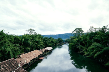 Fototapeta premium Many wooden house floating on the river