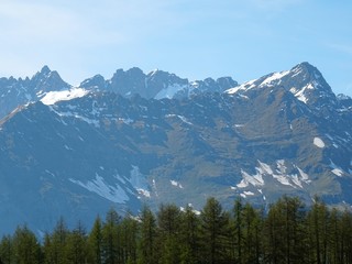 The mountains of the Italian Alps, in Val d'aosta, near the village of Chamois, Italy - June 2019.